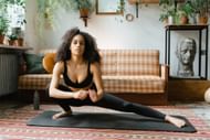 Lateral lunges are a great outer thigh exercise. (Photo via Pexels/MART PRODUCTION)